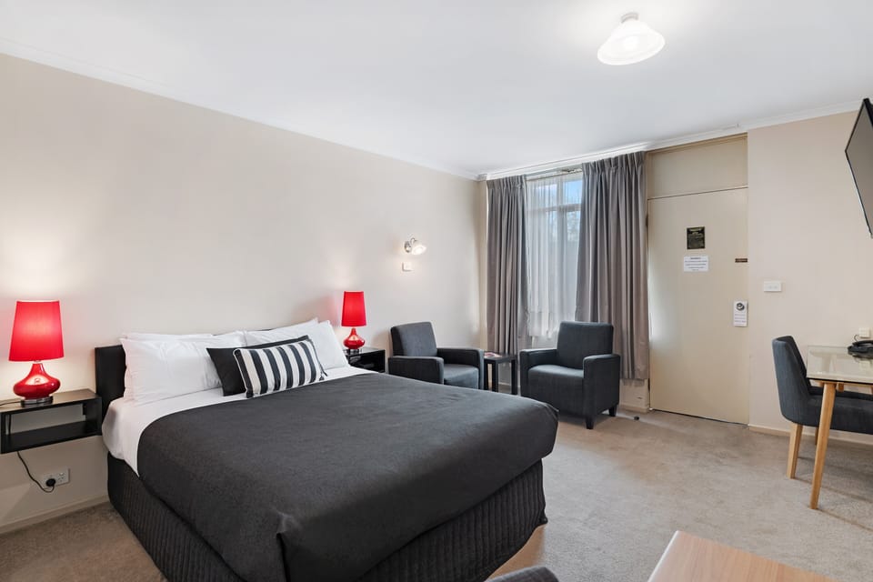 Queen Room | Individually furnished, desk, iron/ironing board, free WiFi