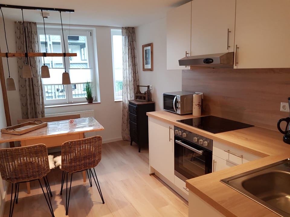 Comfort Apartment | Living area | Flat-screen TV