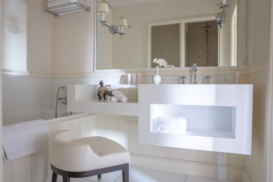 Separate tub and shower, hair dryer, bathrobes, towels