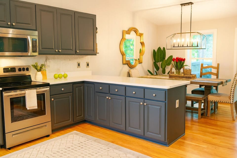 Fully Stocked Modern Kitchen With Stainless Appliances.