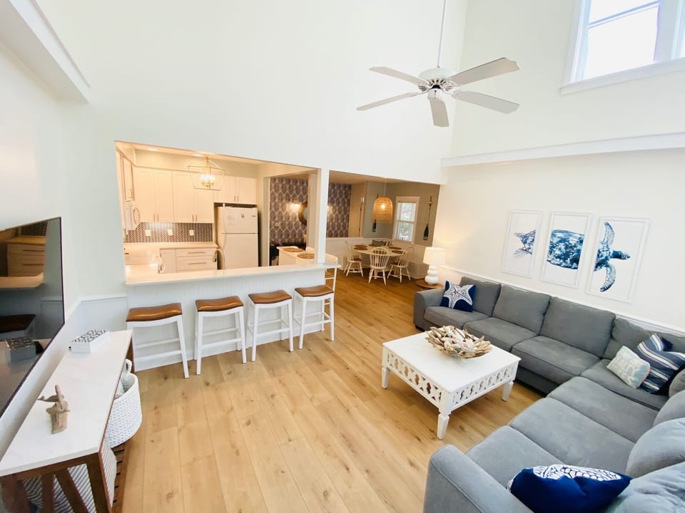 large airy and open living room perfect for large groups to gather.