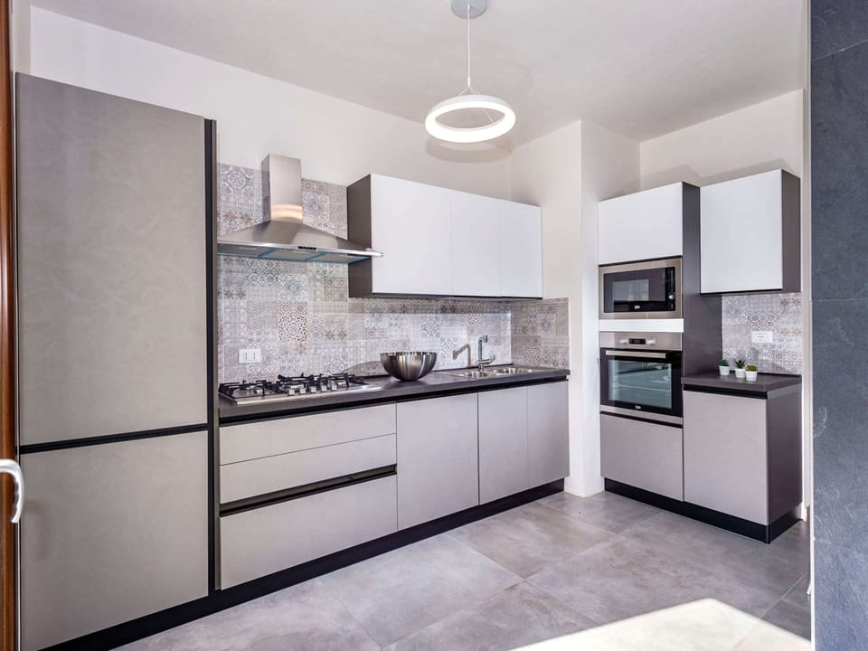 Villa | Private kitchen | Fridge, microwave, oven, dishwasher