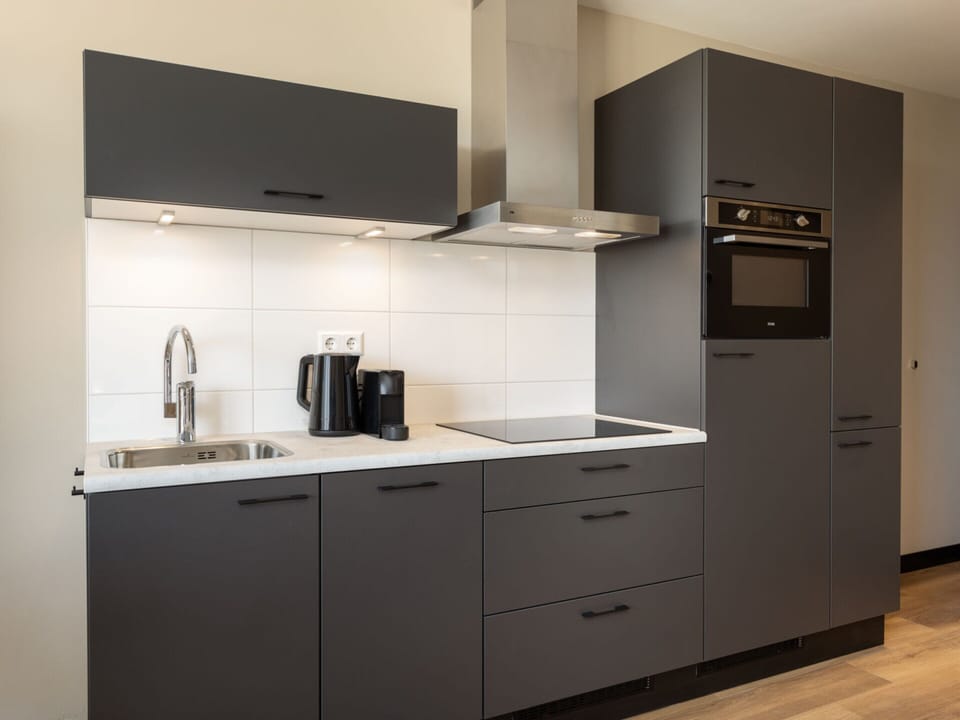 Apartment | Private kitchen | Stovetop, dishwasher