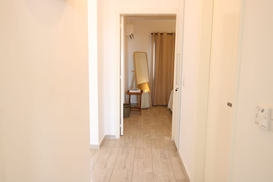 Luxury Apartment | Living area | 43-inch flat-screen TV with cable channels, Smart TV