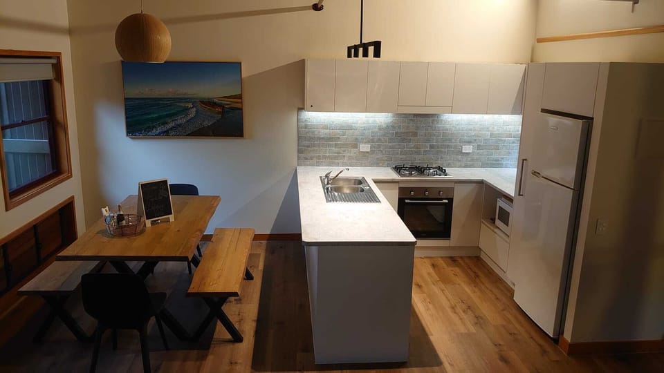 Spacious dining and fully equipped kitchen