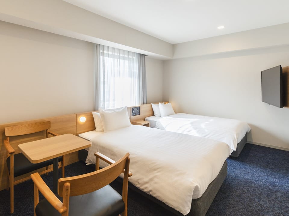 Superior Universal Twin, Non Smoking | Premium bedding, down comforters, desk, free WiFi