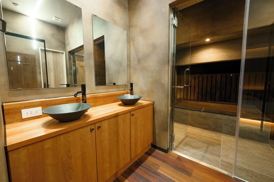 Twin Bedroom with Semi-Open-Air Bath and Sauna | Bathroom | Electronic bidet, towels