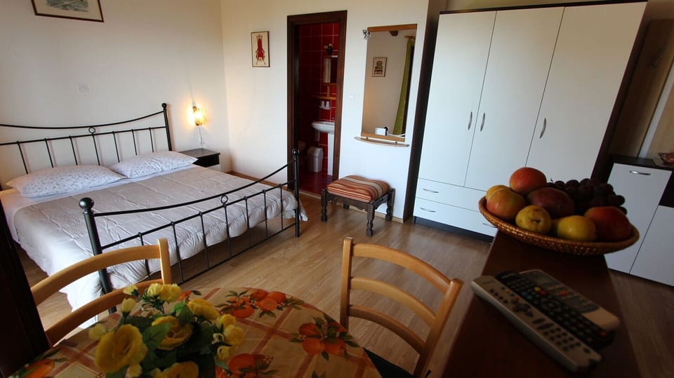 Bed and kitchen