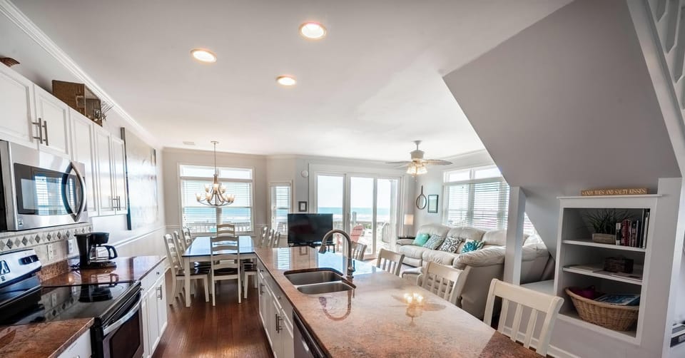 The main level features an open floor plan and a well-appointed kitchen