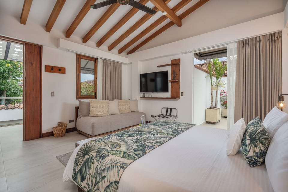 Triple Room | Free minibar, in-room safe, blackout drapes, iron/ironing board