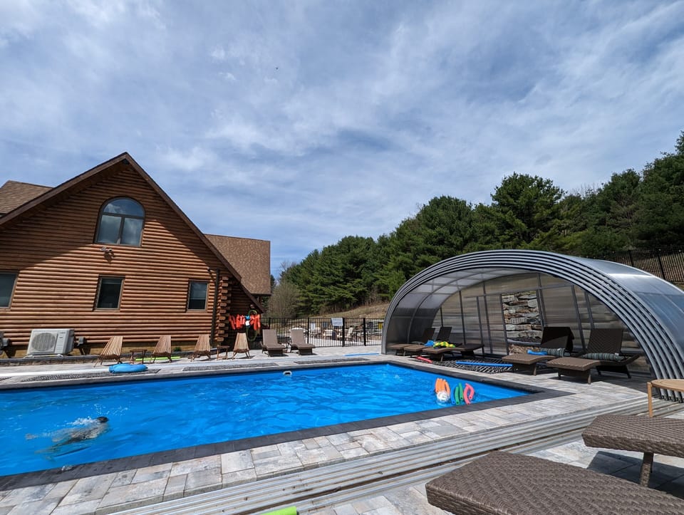 Here's the pool with the cover retracted and the segments stacked together.