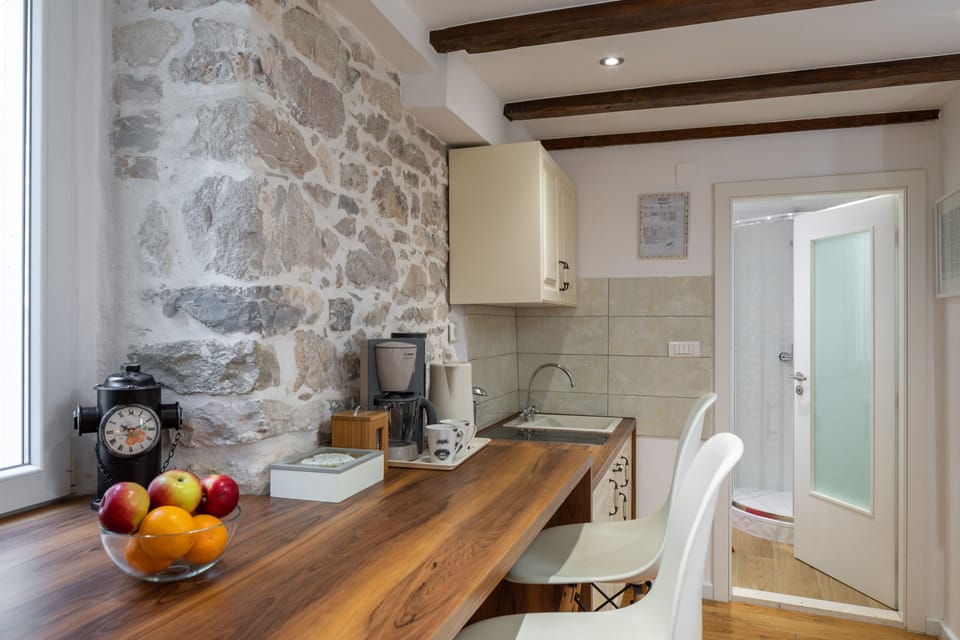 Apartment | Private kitchen | Fridge, stovetop, coffee/tea maker, electric kettle