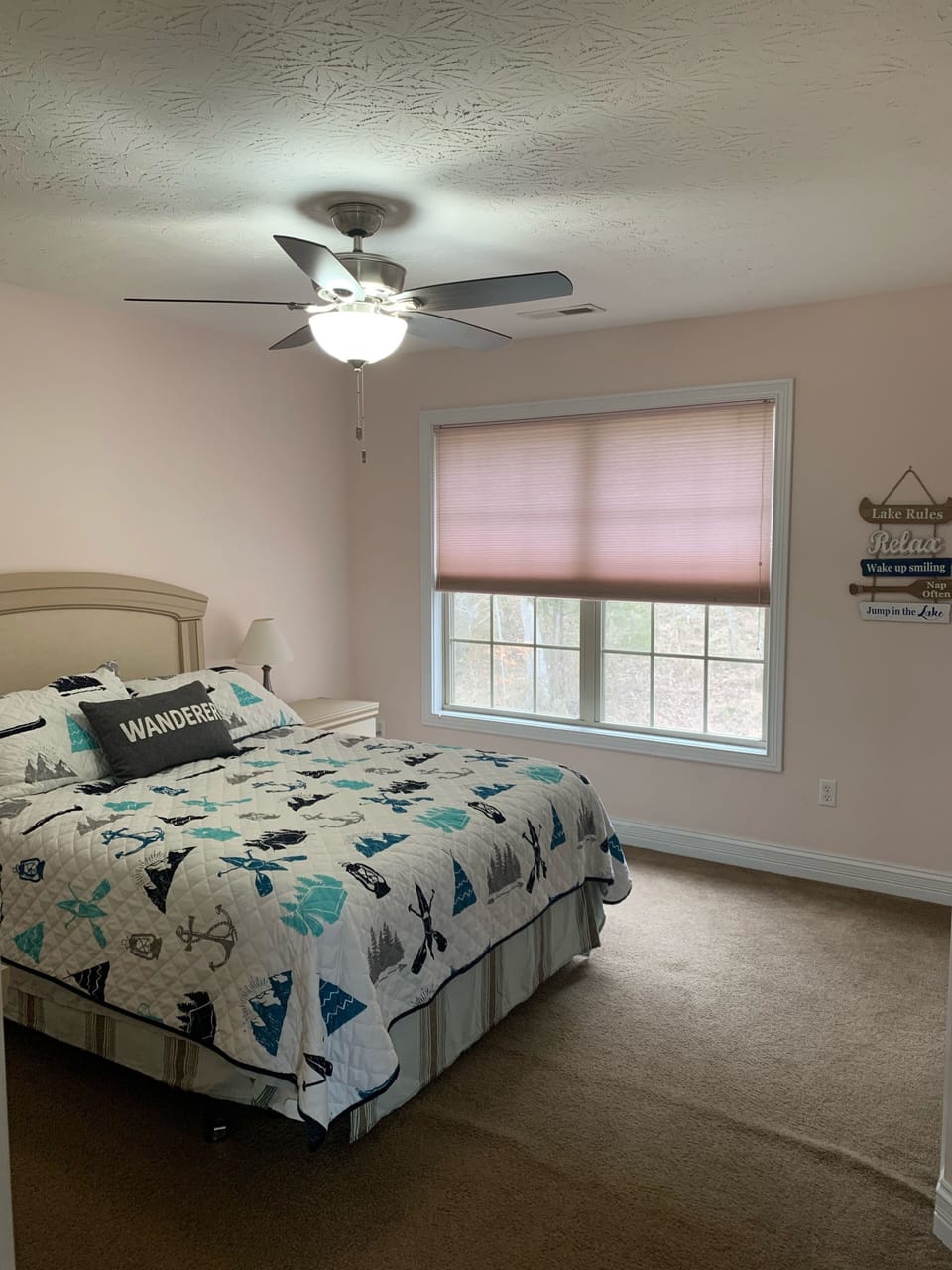 Second floor queen bedroom. Full bathroom directly across the hall. 