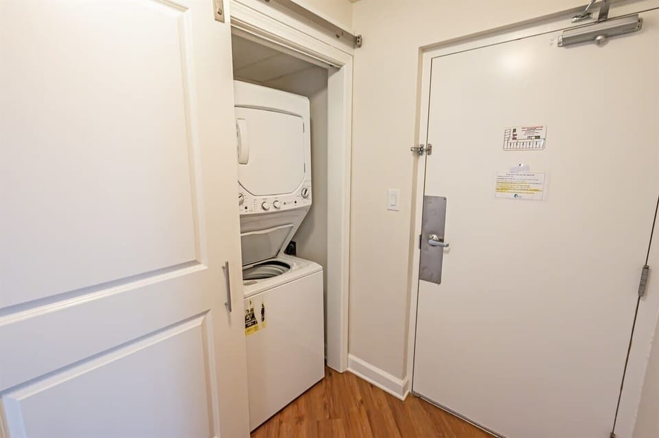 - In-unit washer and dryer for extended vacation stays   - Convenient laundry setup behind sliding closet doors   - Perfect for keeping clothes fresh during beach trips