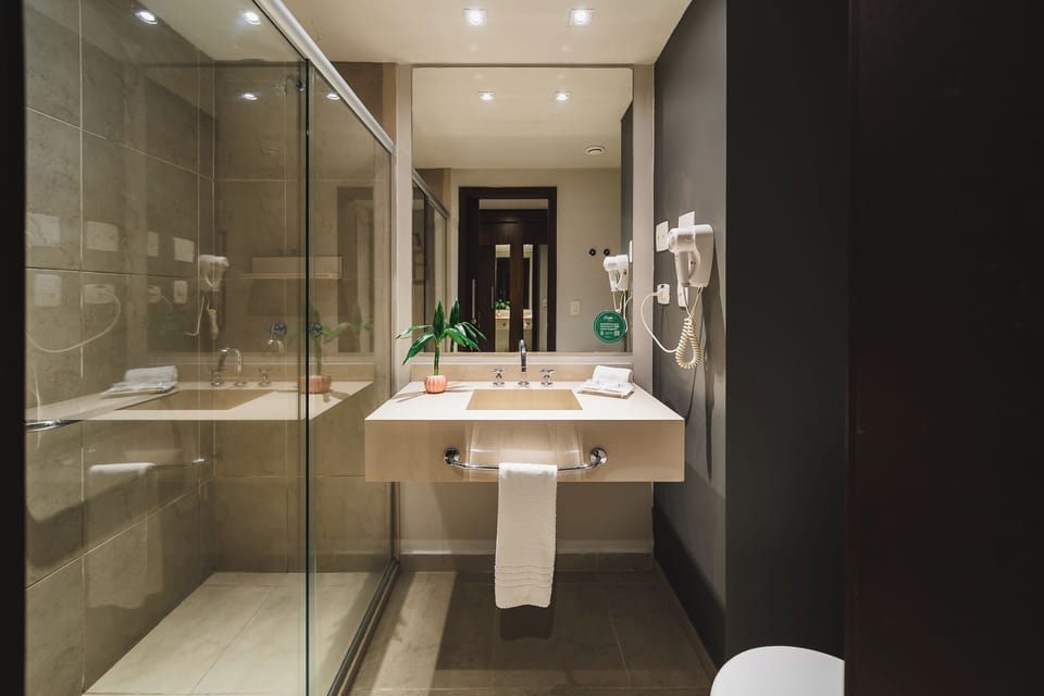 Standard Triple Room, Multiple Beds | Bathroom | Shower, eco-friendly toiletries, hair dryer, towels