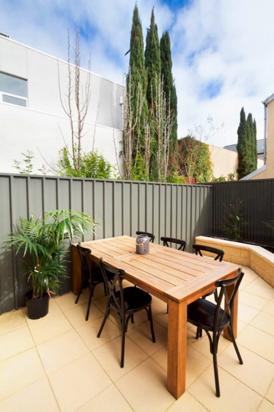 Backyard has a table and seating for six where you can have your morning coffee or dinner outside the main house. The fenced backyard is great for relaxing and/or watching the kids play. 
