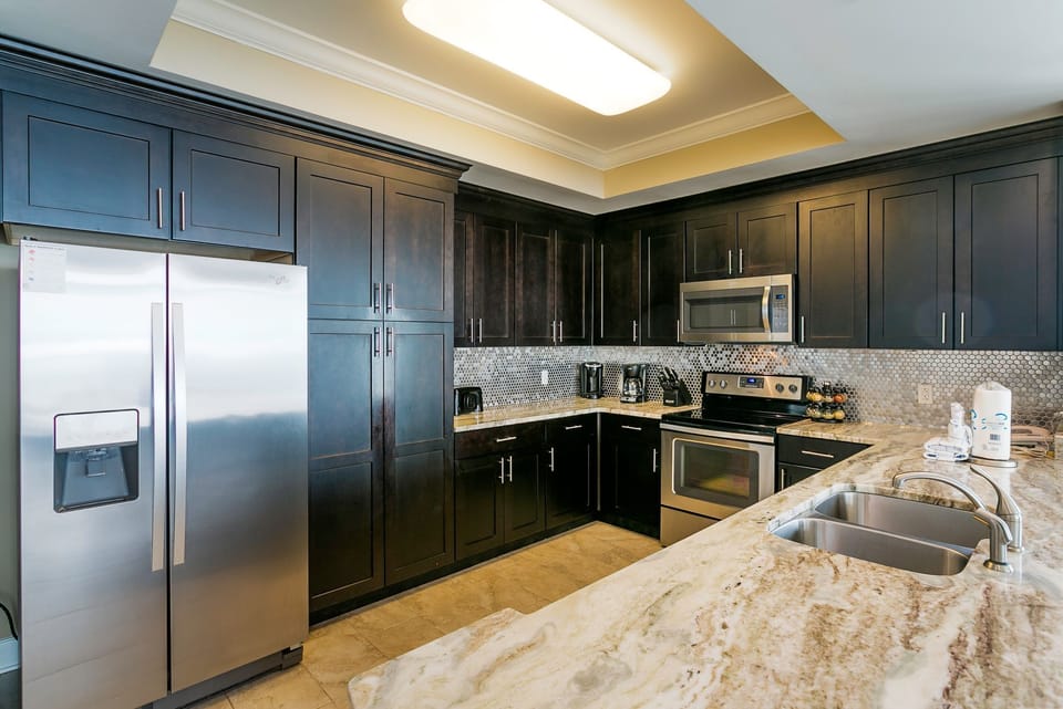Kitchen, Granite, Stainless Appliances, Tile, Knives, Coffeemaker, Keurig, Phone