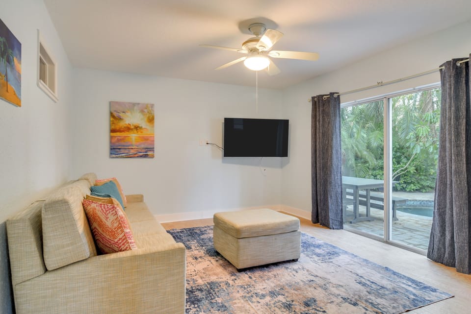 Downstairs Living Space | Ground Floor | A/C Units | Walkout Pool Access