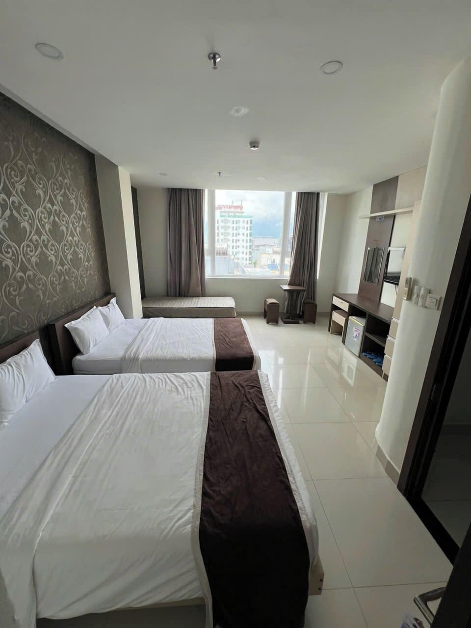 Family Room | Down comforters, minibar, desk, blackout drapes