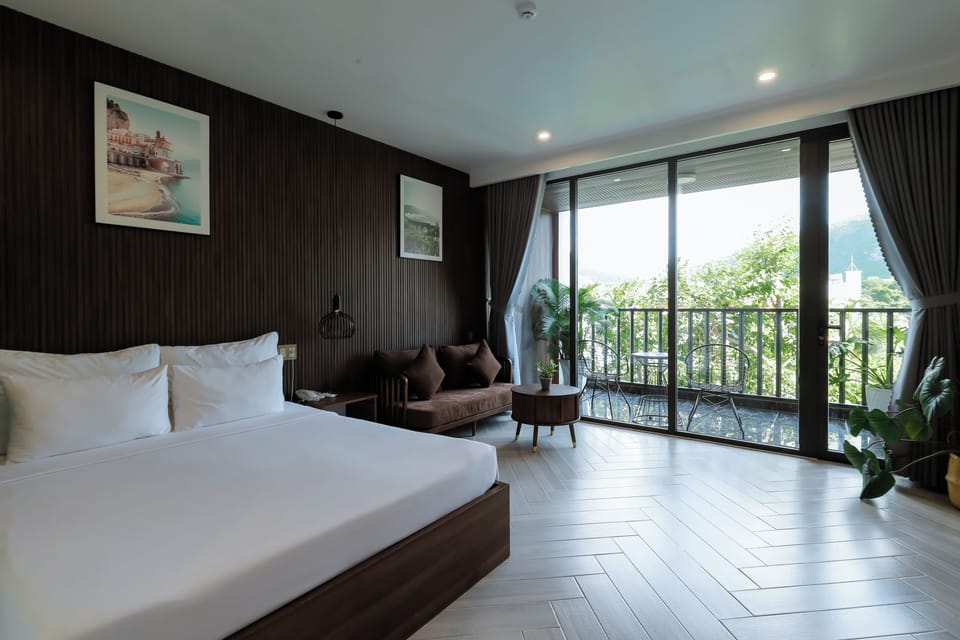 Deluxe Double Room, Balcony | Minibar, desk, laptop workspace, blackout drapes