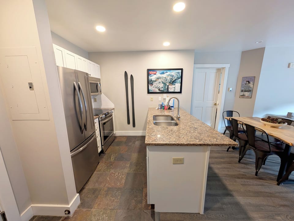 An open layout perfect for cooking meals and gathering with friends.