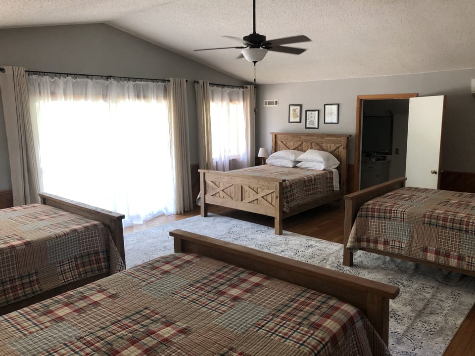 “Bunk Room” 3rd level,  faces west and front driveway out to the hayfields.