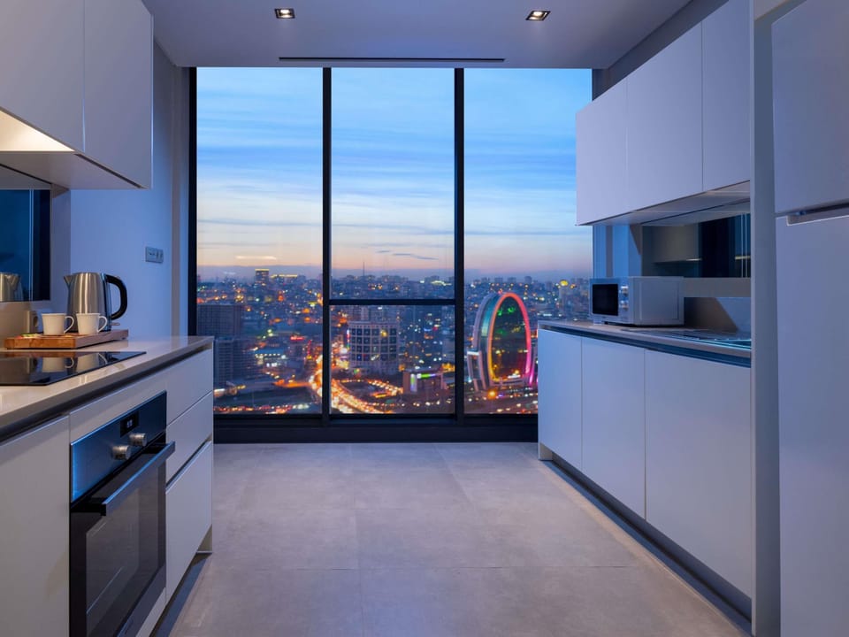 Deluxe Apartment, 3 Bedrooms | In-room safe, desk, blackout drapes, iron/ironing board