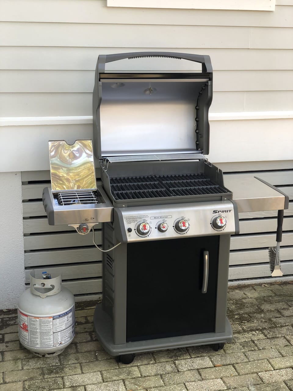 Weber gas grill off the porch for your grilling pleasure!