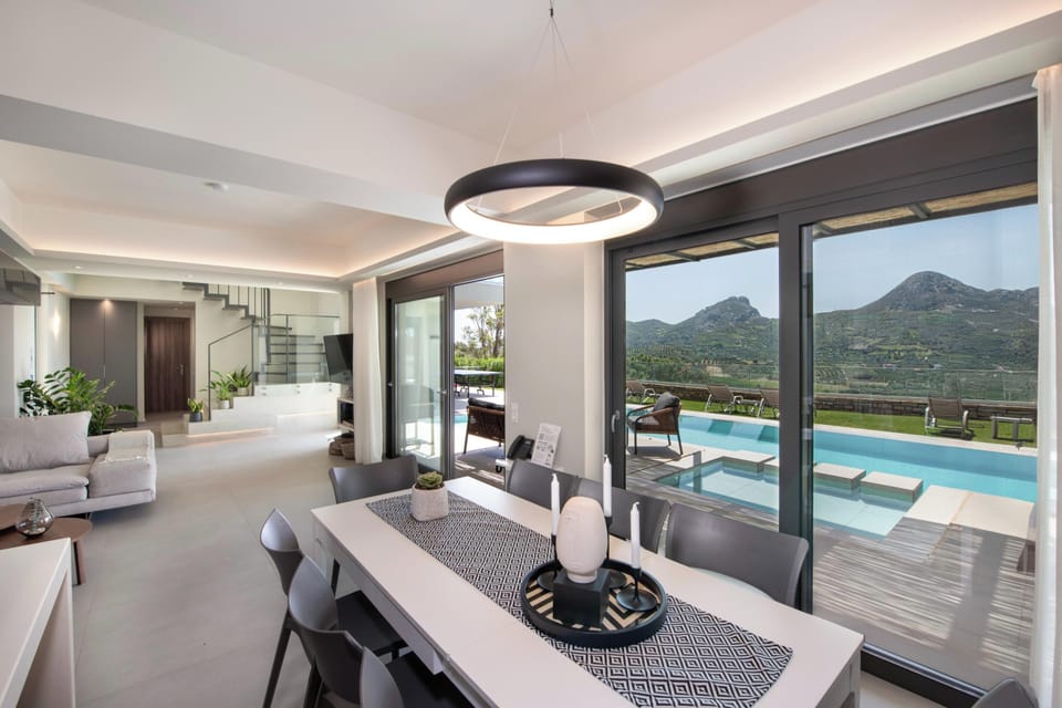 An interior dining table may seat up to 8 guests