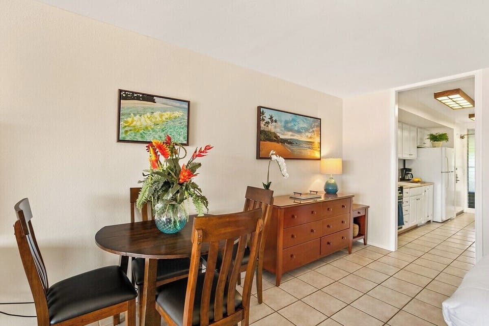 Dining area featuring a 4-seater table, perfect for shared meals