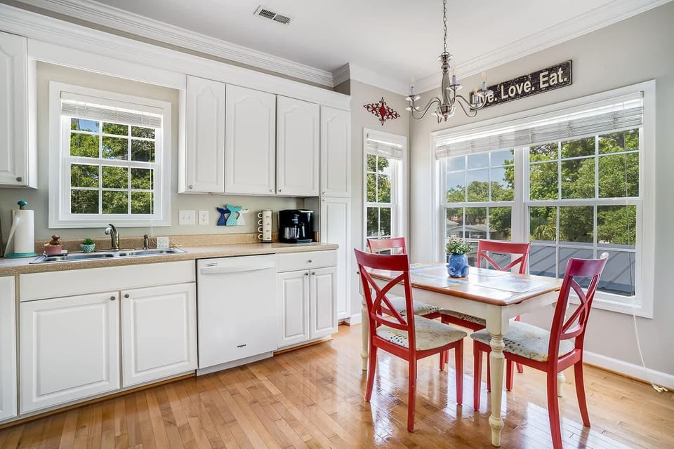 Bright kitchen nook with cozy dining and garden views