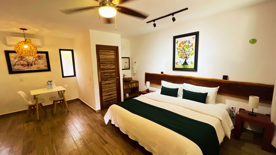 Deluxe Double Room, 1 King Bed, Garden View | Desk, laptop workspace, free WiFi, bed sheets