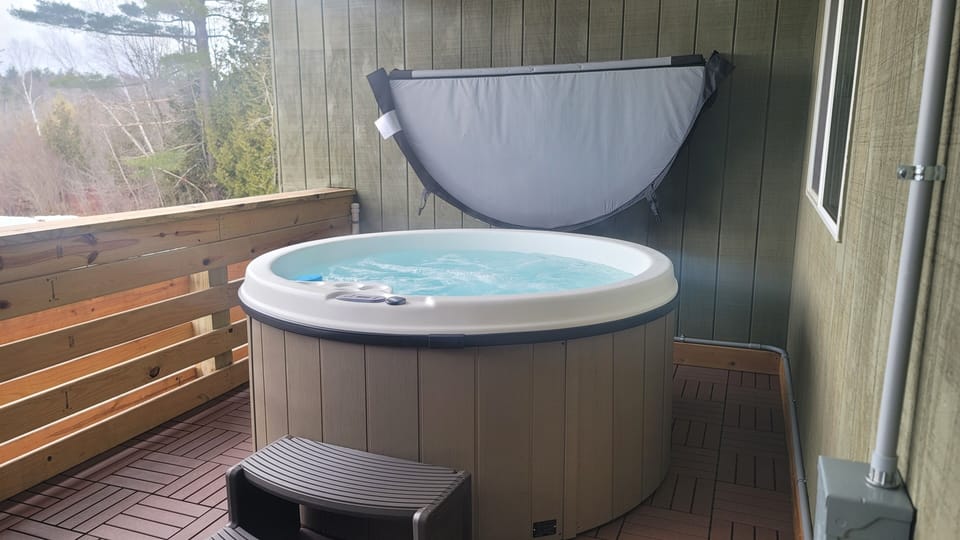 You can relax in your own Private Hot Tub, overlooking a private lake!