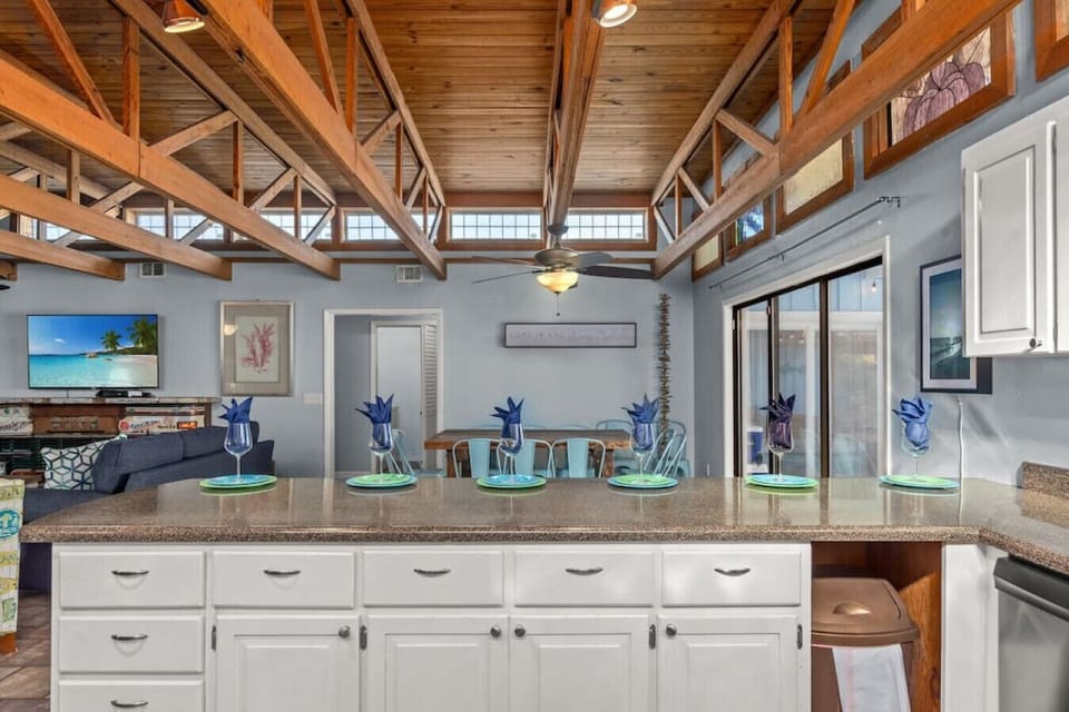 Spacious kitchen - fully-stocked & well-appointed for your stay. Stainless steel appliances and breakfast bar seats 6.