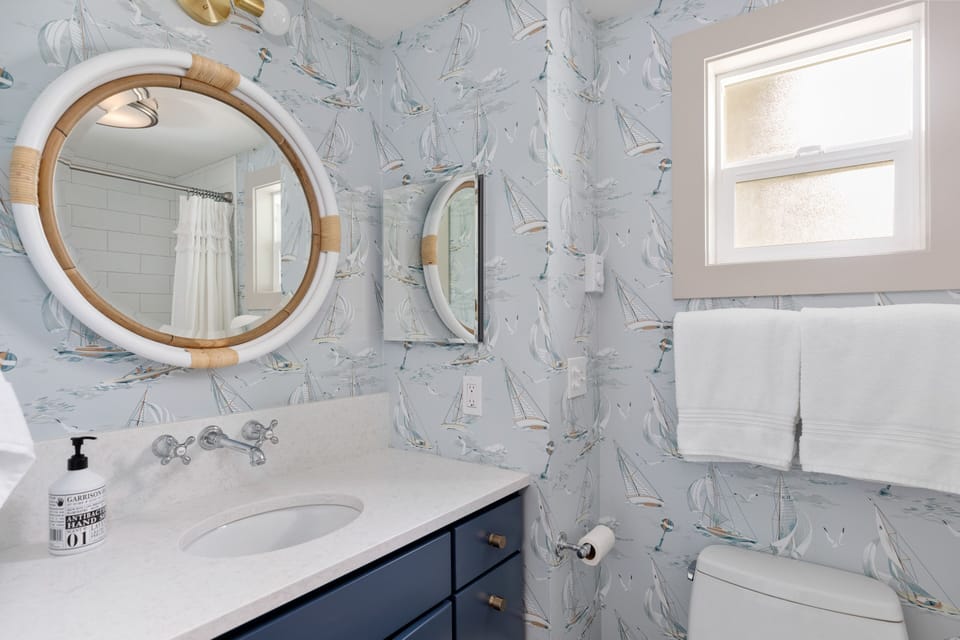 Hall bath with tub shower