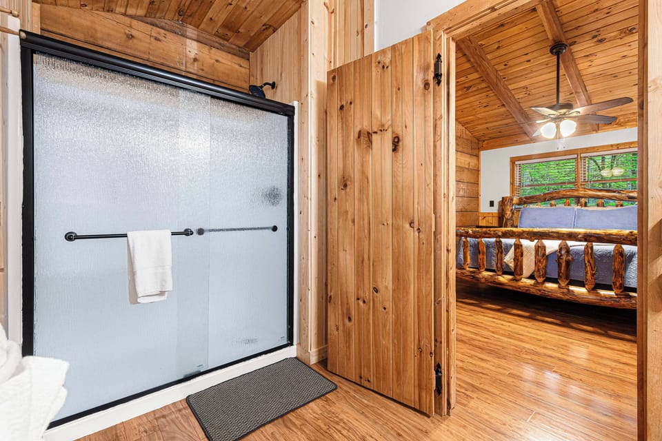 60 Inch shower with glass doors.