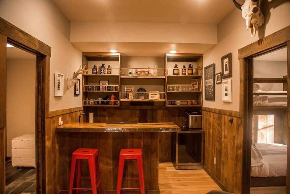 Convenient Kitchenette equipped with a sink, a small refrigerator, a microwave and small coffee make.