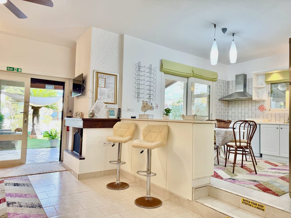 Villa | Private kitchen | Fridge, microwave, oven, stovetop