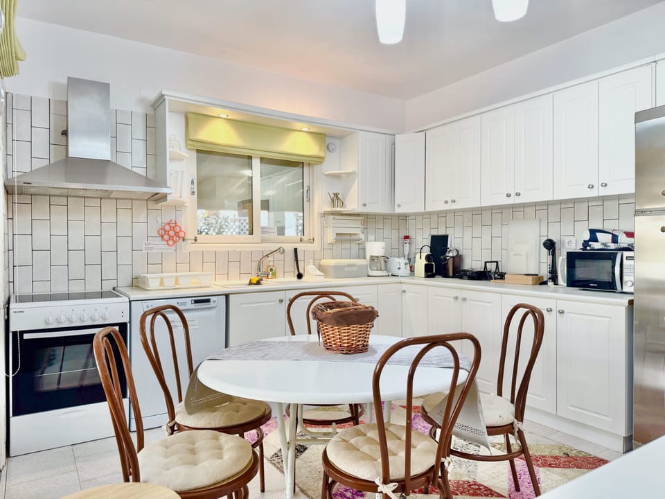 Villa | Private kitchen | Fridge, microwave, oven, stovetop