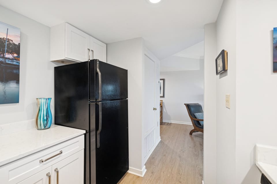 Inviting Kithcen with White Countertops