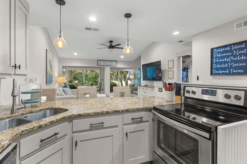 A breakfast bar with three cozy bar stools are available.