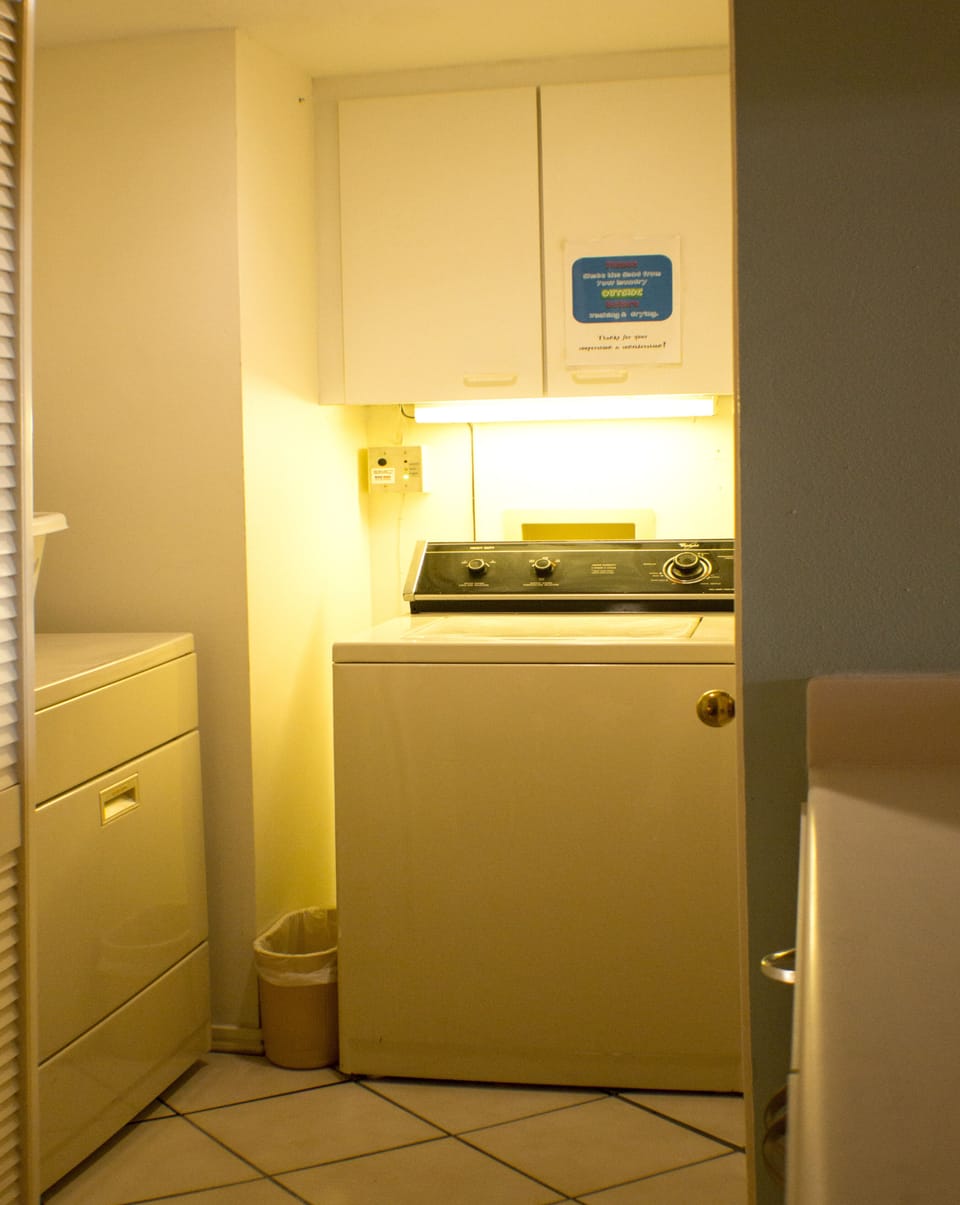 Laundry room with full sized washer and dryer
