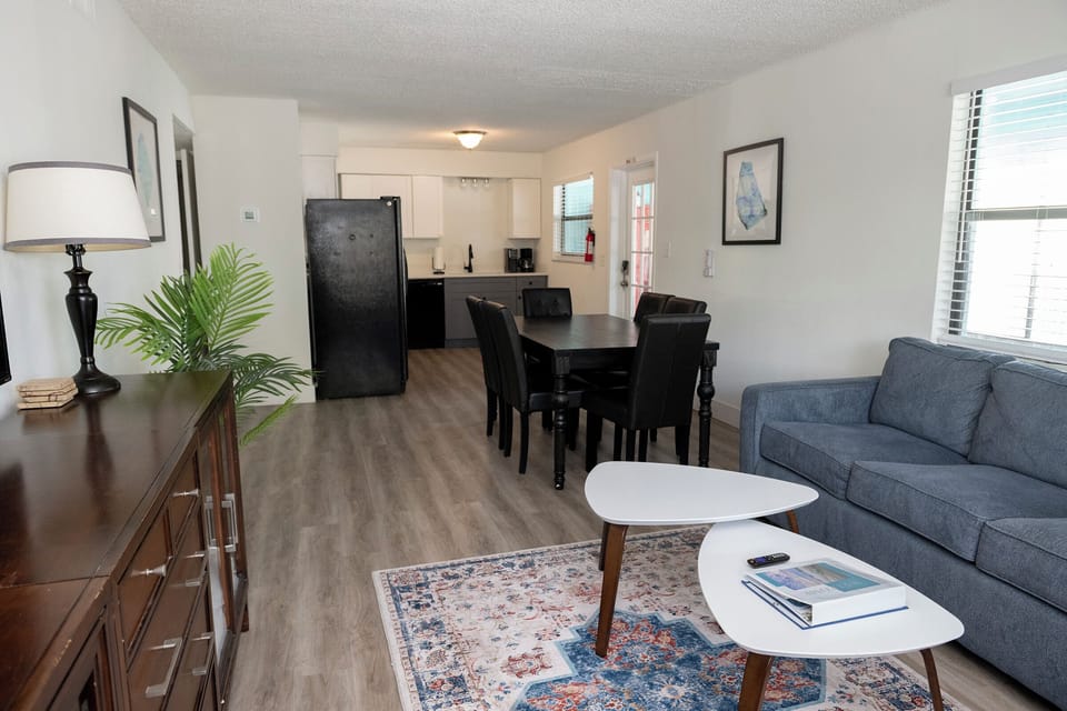 Relax in the living room while watching a movie or your favorite tv shows. The larger couch is a sleeper for two people.