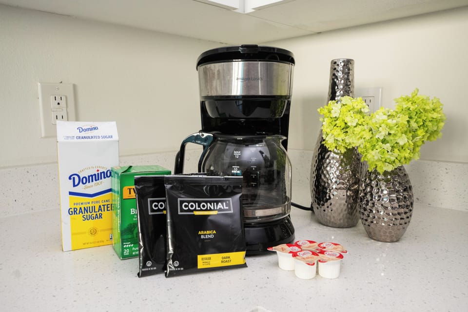 A drop coffee maker as well as basic coffee/supplies are provided. 