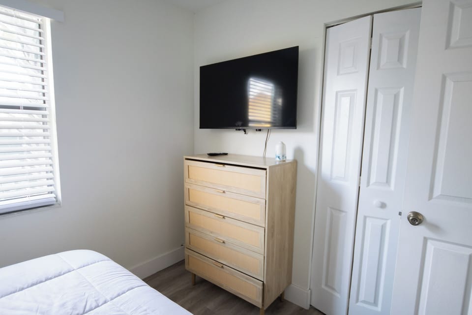 Large TVs in each bedroom plus plenty of storage for clothing. 
