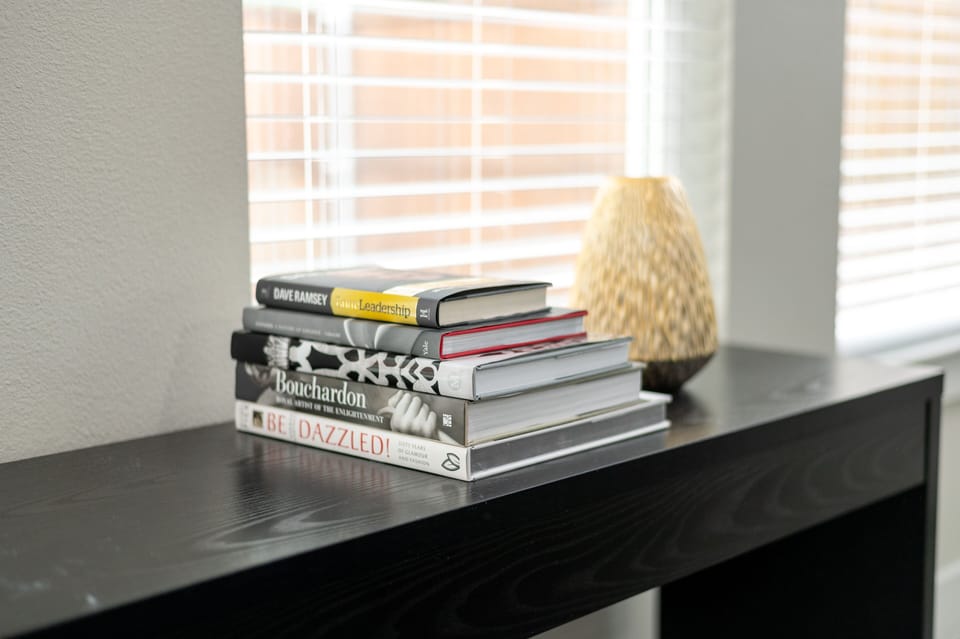 Decorative literature and gold accents throughout. 