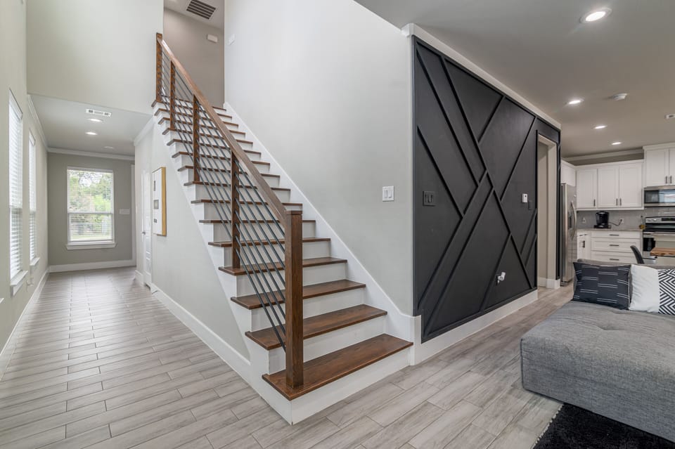 Follow the beautiful wooden staircase upstairs. 