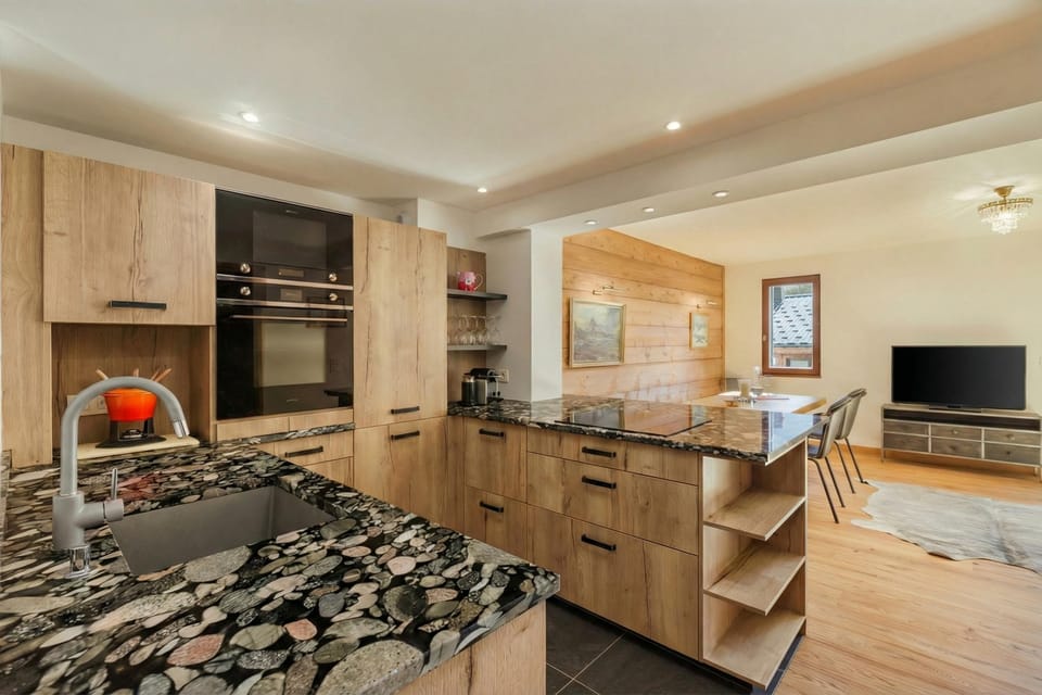 Large open plan kitchen with dining area