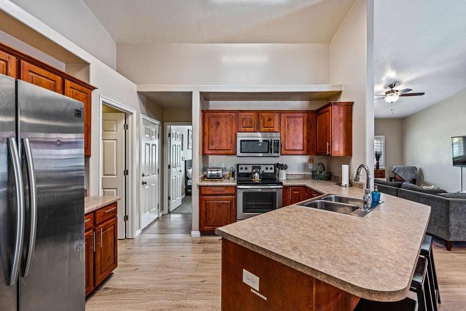 Stainless steel appliances in the kitchen.