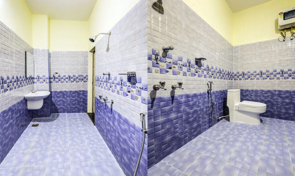 Economy Room | Bathroom | Shower, free toiletries, towels, soap